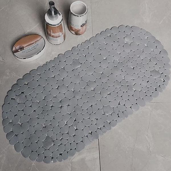 Alfombra para baño fabricada en acrílico de 100x60 cm con un acabado en  color piedra Forme